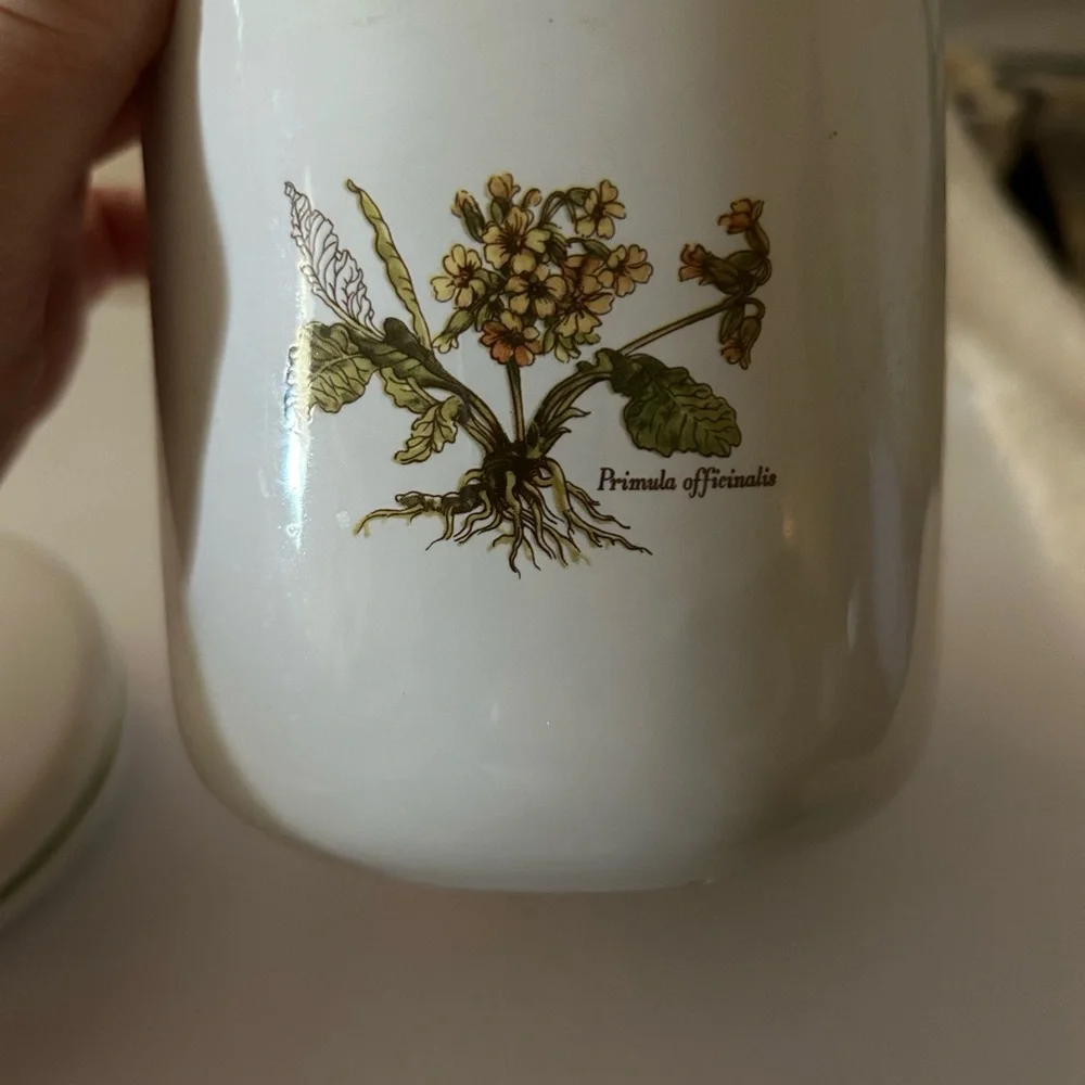 Beautiful flower decorated bathroom ceramic or possibly porcelain container.